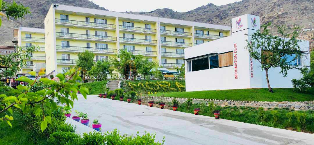 Three people are standing